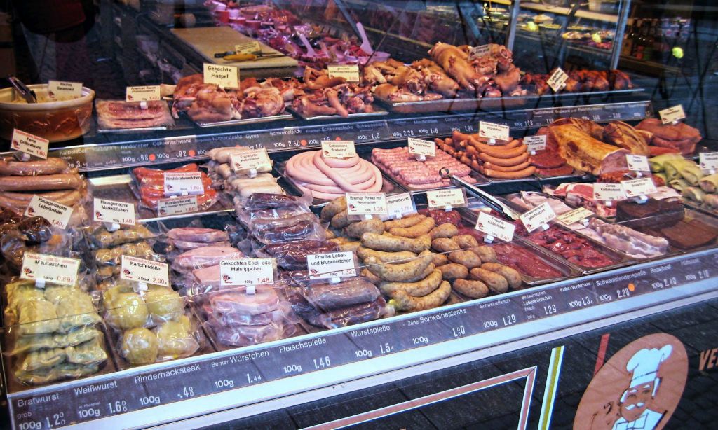 The market was full of delicious looking food, including frankfurters.